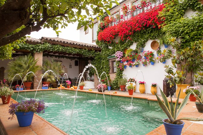 2 Days Cordoba with Mosque Ticket and Hotel Tour - Crossing the Roman Bridge over the Guadalquivir