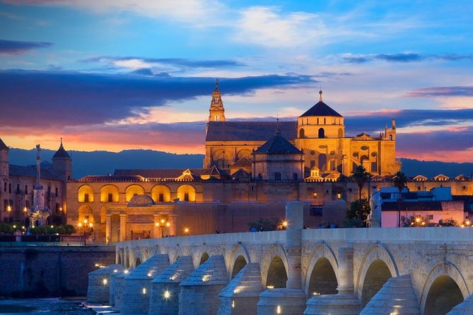 Cordoba City Tour with Mosque-Cathedral from Seville - Crossing the Roman Bridge and meeting Córdoba