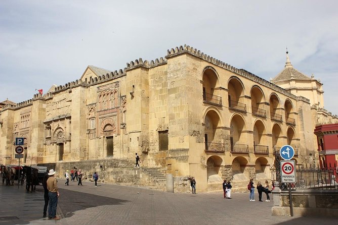 Cordoba Guided Tour Mosque and Cathedral from Seville - Walking through La Judería