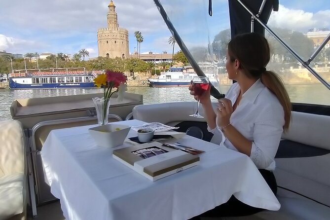 Exclusive Seville Boat Tour with Shared Tapas - San Telmo Palace and the 1929 exhibition buildings