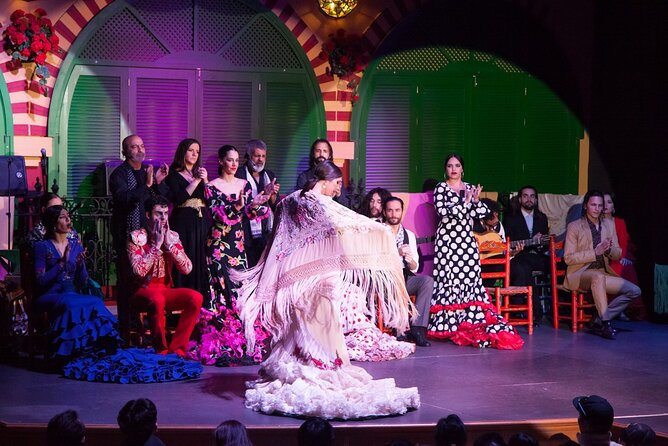 Flamenco Show and Dinner in Seville - A large theater stage rather than a tiny tablao