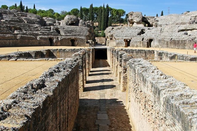 Group Excursion from Seville to Italica (Seville Roman Town) - San Isidoro del Campo, a fortress monastery before the ruins