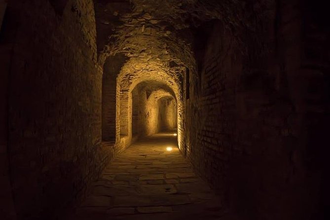 Italica 2-Hour Private Guided Tour - Entering the amphitheater where Roman games took place