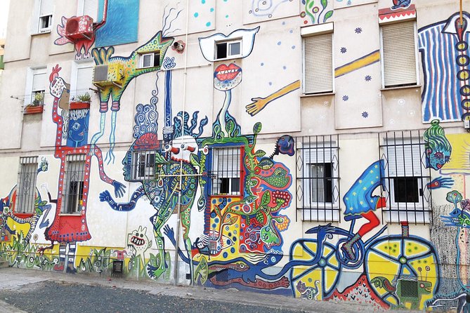 Off the Beaten Path: Seville Urban Walking Tour - The Alcázar, San Telmo, and the Tobacco Factory