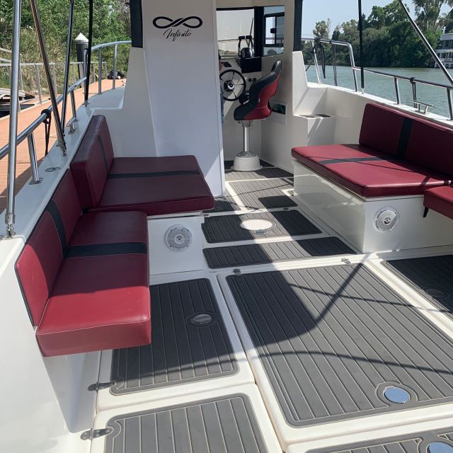 Private boat trip on the Guadalquivir - Puente de las Delicias and the riverfront beyond
