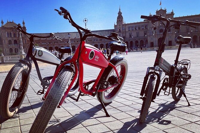 Ride Seville by E‐Bike – Small Group Local Experience - Across Puente de Triana to Mercado de Triana