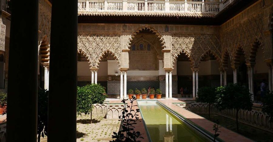 Royal Alcázar of Seville Skip-the-Line Guided Tour - Finding the orange umbrella at Plaza del Triunfo