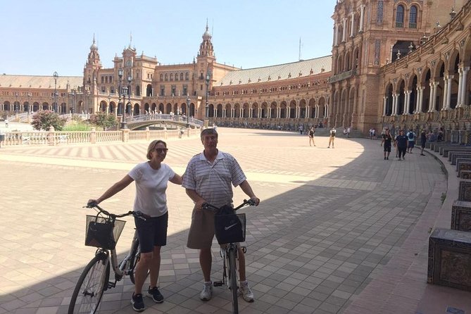 Sevilla Daily Bike Tour - The riverfront and bullring add two different Seville stories