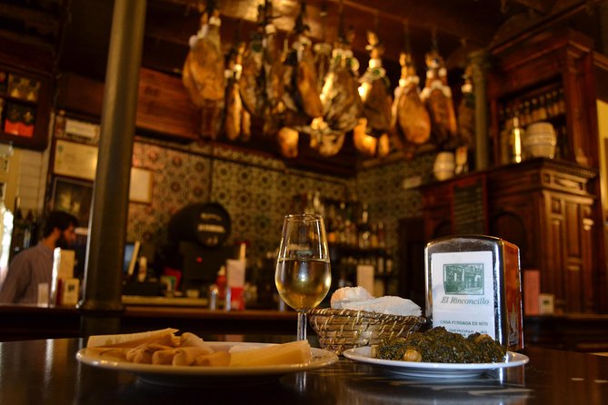 Sevilla Food Tour: Tapas, Wine, History & Traditions - Chicharrones and Montaditos at Los Soportales