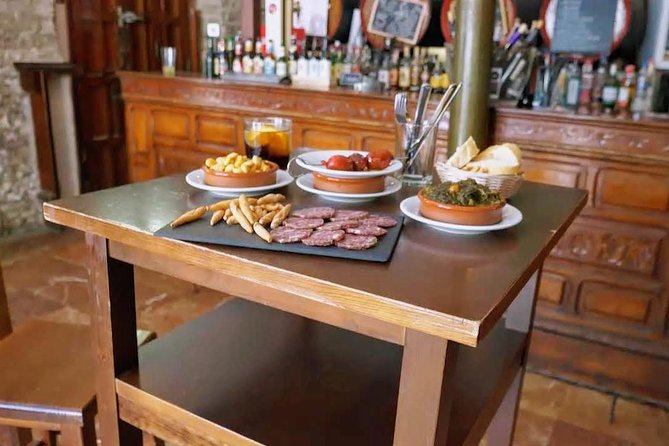 Sevilla Food Tour: Tapas, Wine, History & Traditions - Walking Through the Historic Center