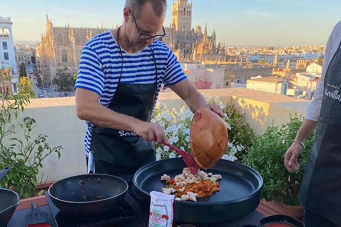 Sevilla: Rooftop Paella Cooking Class & 30-minute expert Q&A - Sangria, stories, and a 30-minute question period