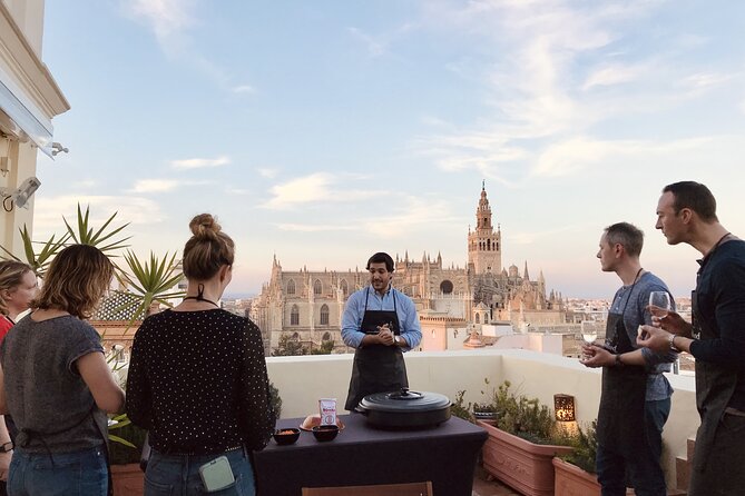 Sevilla: Rooftop Paella Cooking Class & 30-minute expert Q&A - Welcome drinks, appetizers, and the first look from above