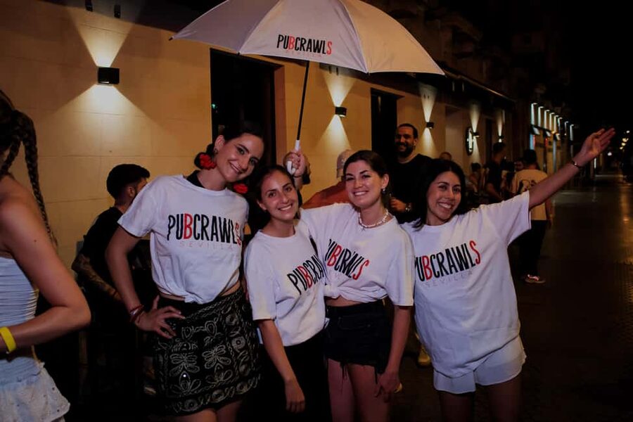 Seville: 3 Bars Pub Crawl + VIP Club Entrance & 3 Free Shots - Three bars, three shots, and a moving group
