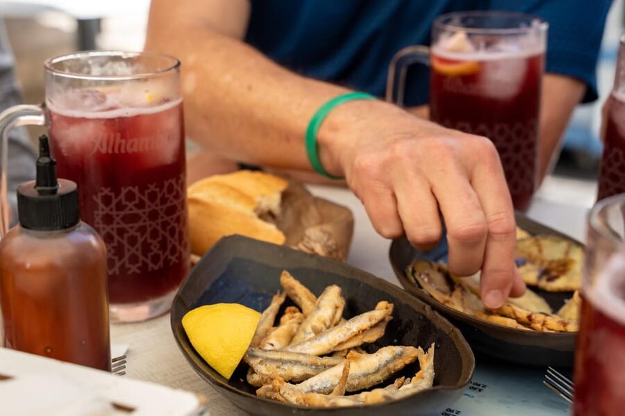 Seville Adventure: Historic Walking Tour & Traditional Tapas - Santa Cruz and the Orange Tree