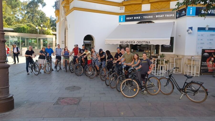 Seville: All Day Bike Rental - Riding beside the Guadalquivir River