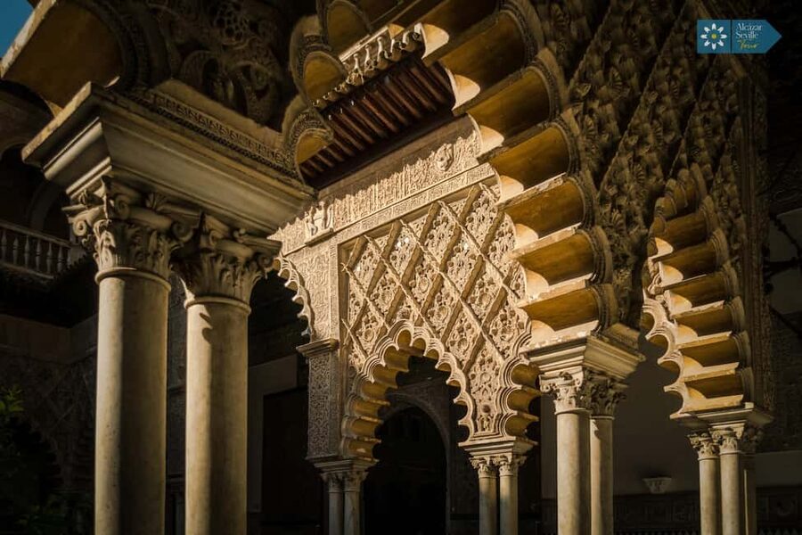 Seville: Cathedral, Giralda, and Royal Alcázar Guided Tour - Climbing the Giralda’s Moorish ramps