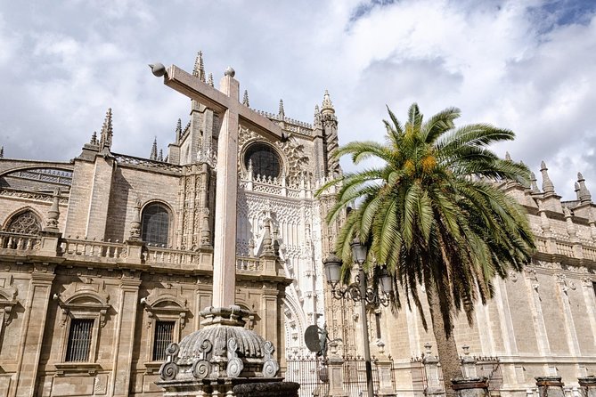 Seville: Cathedral Guided Tour with Priority Access - The mosque courtyard and Seville’s layered past