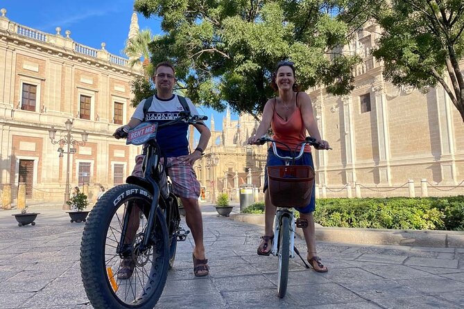 Seville ElectricBike Tour 2h | Explore Like a Local | Small Group - Passing the Alcázar and the city’s cathedral