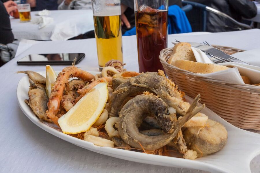 Seville Food Tour with Tapas & Drinks with a Local - Cod fritters and Andalusian cold soup