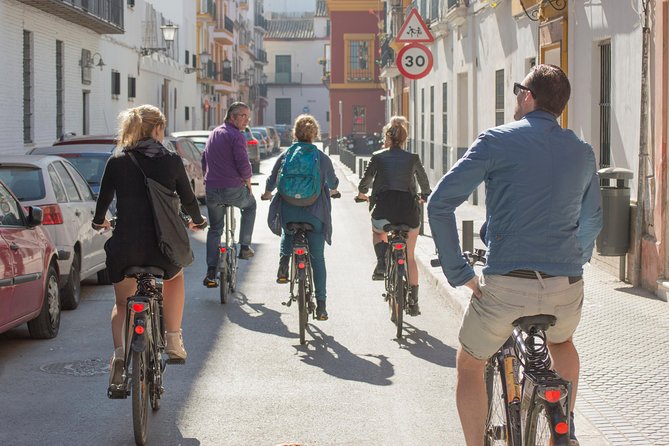 Seville Guided Bike Tour - Along the bullring toward the river