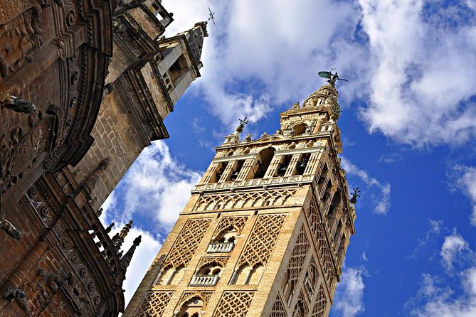 Seville Guided Tour into Alcazar and Cathedral Skip the Line - Seville Cathedral: huge scale, layered meaning