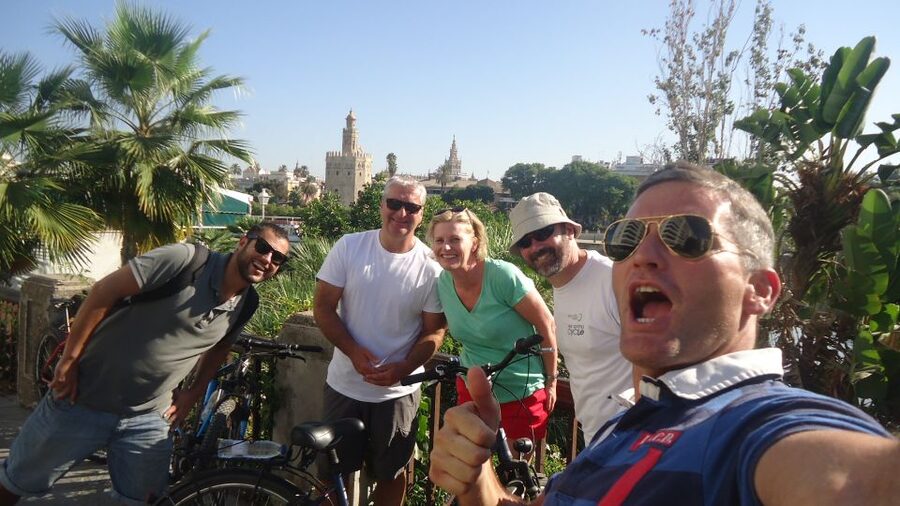 Seville: Highlights City Bike Tour - Maria Luisa Park: shade, greenery, and a calmer pace