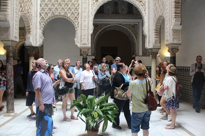 Seville Highlights: Private Family Guided Tour - Santa Cruz, where the tour slows down