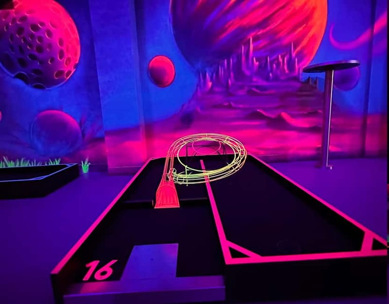 Seville: Indoor UV 18 hole Minigolf Experience - Playing during the heat of the day