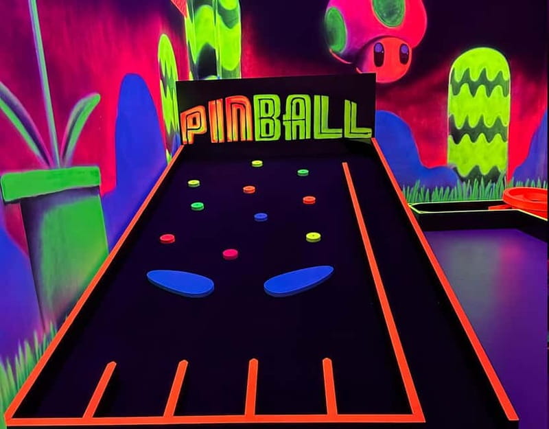 Seville: Indoor UV 18 hole Minigolf Experience - How the $16 price works for you