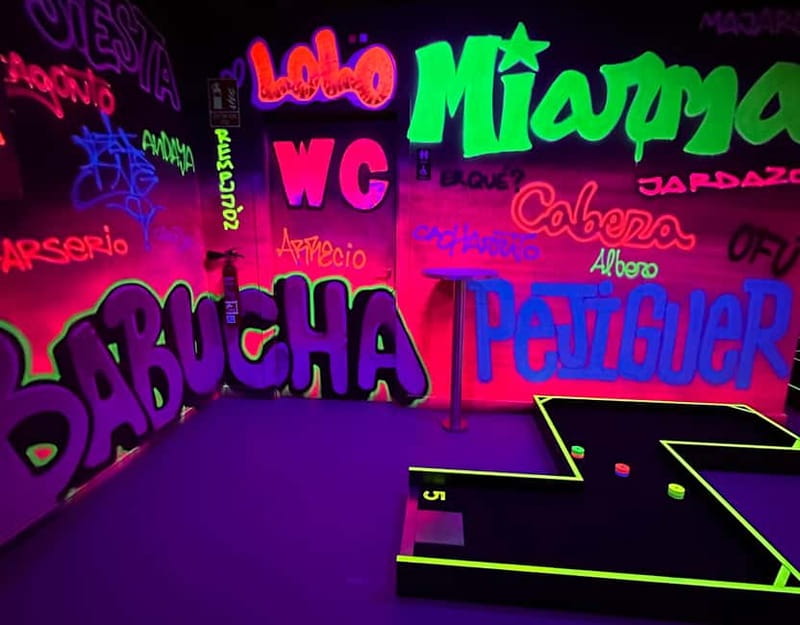 Seville: Indoor UV 18 hole Minigolf Experience - A relaxed choice for couples and friends
