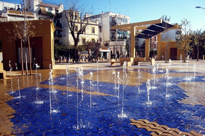 Seville Off the Beaten Path Tapas and Market Tour - Alameda at night, with food close by