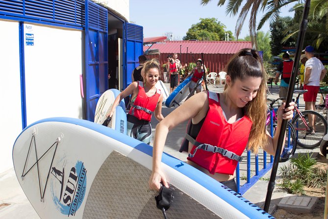 Seville Paddle Surf Sup in the Guadalquivir River - Passing the bullring and Torre del Oro