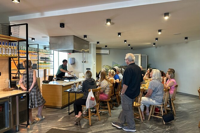 Seville: Paella Showcooking Experience - Start With Cheese, Olives, and Iberian Sausage