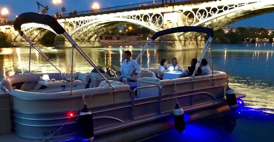 Seville: Private Boat Tour with Paella Lunch and Drinks - The skippers add more than directions