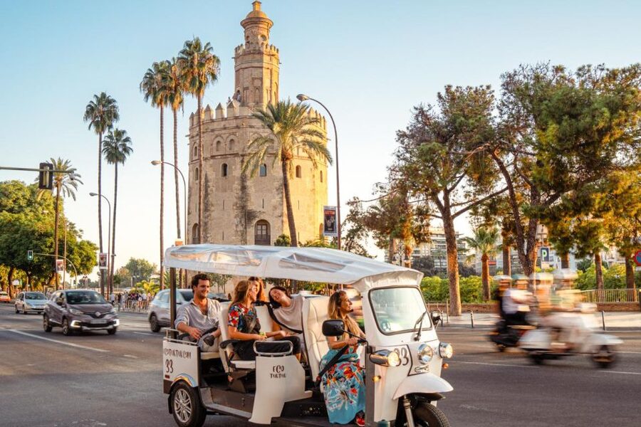 Seville: Private City Tour by Eco Tuk Tuk - The guides are the heart of the experience