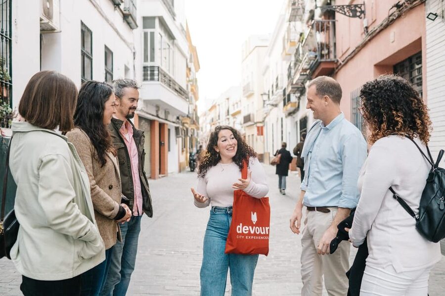 Seville: Private Tapas & History Tour in Triana Neighborhood - Freiduría Reina Victoria and the taste of the April Fair