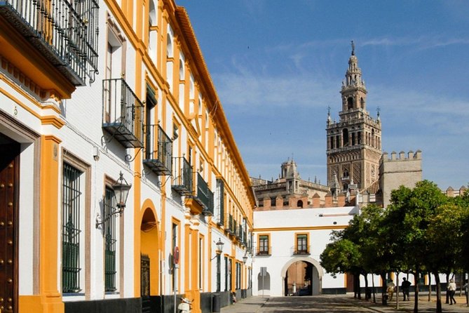 Seville Private Walking Tour with Alcazar & Cathedral Tickets - Royal Alcazar, from Islamic palace to royal home