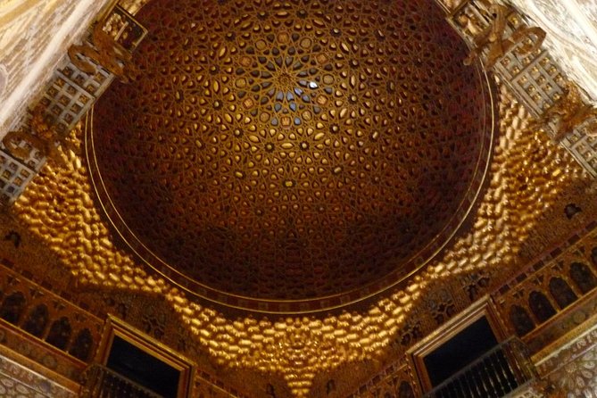 Seville Private Walking Tour with Alcazar & Cathedral Tickets - Santa Cruz and the stories behind its lanes
