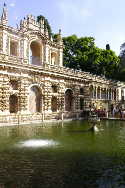 Seville: Royal Alcazar of Seville Tour - Inside the Alcázar: tiles, doors, domes, and water
