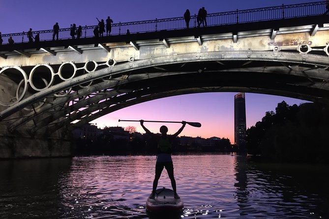 Seville: Sunset in Paddle Surf - Paddling past the Torre del Oro