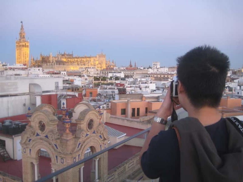 Seville: Sunset Roof Top Walking Tour - The Alcazar walls and the old city edge