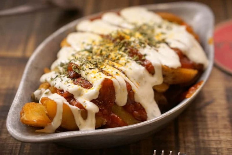 Seville: Tapas Walking Tour with Traditional Flamenco Show - Dietary needs, walking, and age limits