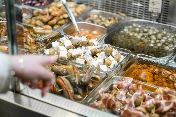 Seville: Triana Market Tapas Tour - The guides and their style
