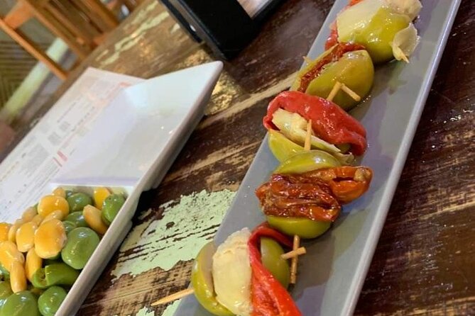 Seville Vegan Tapas Food and Market Walking Tour - Three or four Triana stops for vegan tapas