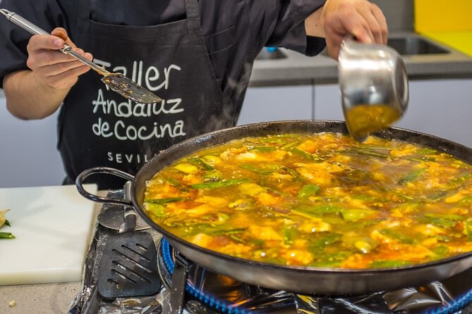 Spanish Cooking Class & Triana Market Tour in Sevilla - Making spinach with chickpeas, a Sevillian tapa