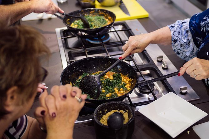 Spanish Cooking Class & Triana Market Tour in Sevilla - Sitting down to the lunch you prepared