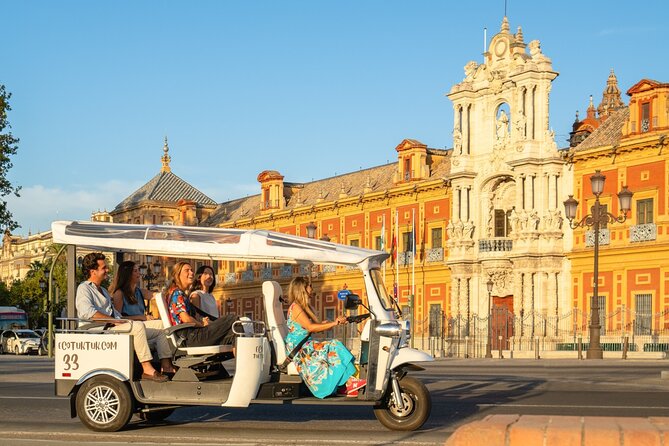 Tour Welcome Seville with Local Guide in Eco Tuk Tuk Private - Crossing the Guadalquivir to Triana