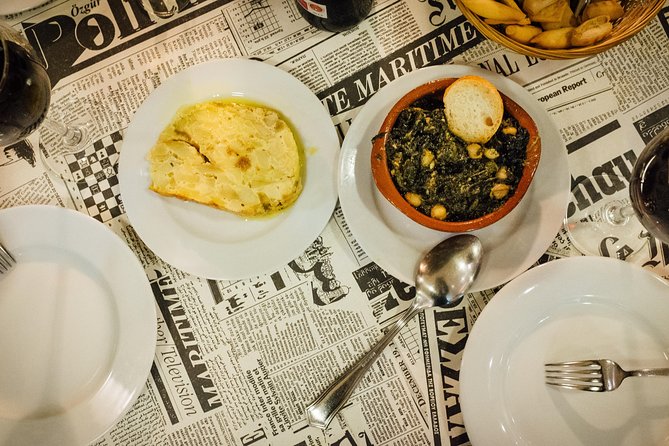 Triana Gourmet Tapas Tour in Seville - River views, ceramics, and local names